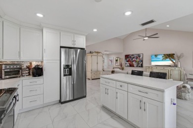 BEAUTIFULLY RENOVATED HOME WITH BREATHTAKING LAKE VIEWS on Boca West Golf and Country Club in Florida - for sale on GolfHomes.com, golf home, golf lot