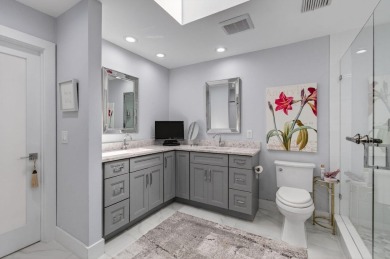 BEAUTIFULLY RENOVATED HOME WITH BREATHTAKING LAKE VIEWS on Boca West Golf and Country Club in Florida - for sale on GolfHomes.com, golf home, golf lot