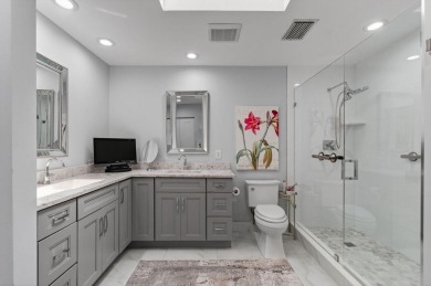 BEAUTIFULLY RENOVATED HOME WITH BREATHTAKING LAKE VIEWS on Boca West Golf and Country Club in Florida - for sale on GolfHomes.com, golf home, golf lot