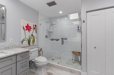 BEAUTIFULLY RENOVATED HOME WITH BREATHTAKING LAKE VIEWS on Boca West Golf and Country Club in Florida - for sale on GolfHomes.com, golf home, golf lot