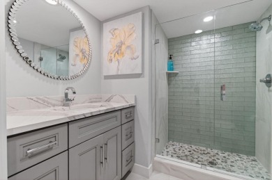 BEAUTIFULLY RENOVATED HOME WITH BREATHTAKING LAKE VIEWS on Boca West Golf and Country Club in Florida - for sale on GolfHomes.com, golf home, golf lot