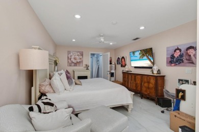 BEAUTIFULLY RENOVATED HOME WITH BREATHTAKING LAKE VIEWS on Boca West Golf and Country Club in Florida - for sale on GolfHomes.com, golf home, golf lot