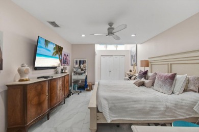 BEAUTIFULLY RENOVATED HOME WITH BREATHTAKING LAKE VIEWS on Boca West Golf and Country Club in Florida - for sale on GolfHomes.com, golf home, golf lot