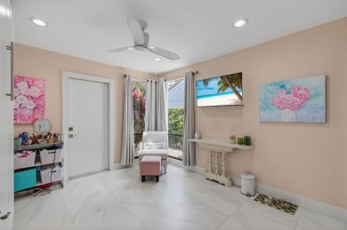 BEAUTIFULLY RENOVATED HOME WITH BREATHTAKING LAKE VIEWS on Boca West Golf and Country Club in Florida - for sale on GolfHomes.com, golf home, golf lot