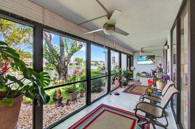 BEAUTIFULLY RENOVATED HOME WITH BREATHTAKING LAKE VIEWS on Boca West Golf and Country Club in Florida - for sale on GolfHomes.com, golf home, golf lot