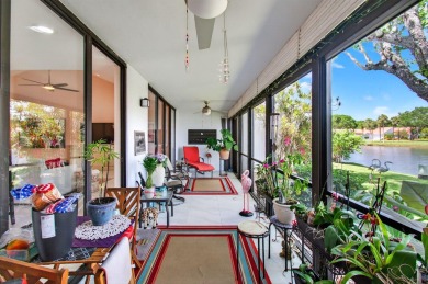 BEAUTIFULLY RENOVATED HOME WITH BREATHTAKING LAKE VIEWS on Boca West Golf and Country Club in Florida - for sale on GolfHomes.com, golf home, golf lot