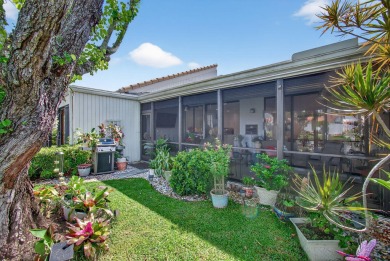 BEAUTIFULLY RENOVATED HOME WITH BREATHTAKING LAKE VIEWS on Boca West Golf and Country Club in Florida - for sale on GolfHomes.com, golf home, golf lot