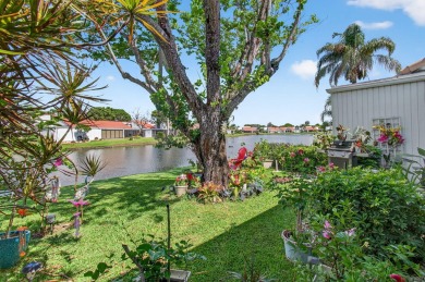 BEAUTIFULLY RENOVATED HOME WITH BREATHTAKING LAKE VIEWS on Boca West Golf and Country Club in Florida - for sale on GolfHomes.com, golf home, golf lot