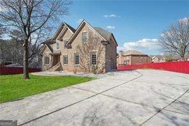 Discover this STUNNING 4-sided brick home located within the on Heritage Golf Links in Georgia - for sale on GolfHomes.com, golf home, golf lot