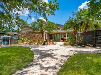 RENOVATED HOME ON OVER 5 ACRES IN THE MUCH SOUGHT AFTER GATOR on Gator Creek Golf Club in Florida - for sale on GolfHomes.com, golf home, golf lot