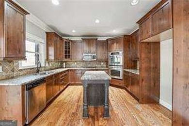 Discover this STUNNING 4-sided brick home located within the on Heritage Golf Links in Georgia - for sale on GolfHomes.com, golf home, golf lot
