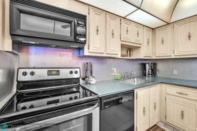 Welcome to this charming, fully furnished 1-bedroom, 1.5-bath on Palm-Aire Country Club and Resort - The Oaks in Florida - for sale on GolfHomes.com, golf home, golf lot