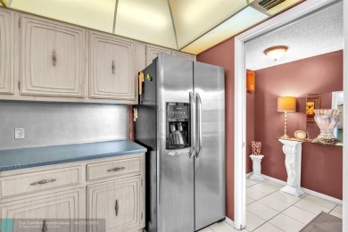 Welcome to this charming, fully furnished 1-bedroom, 1.5-bath on Palm-Aire Country Club and Resort - The Oaks in Florida - for sale on GolfHomes.com, golf home, golf lot