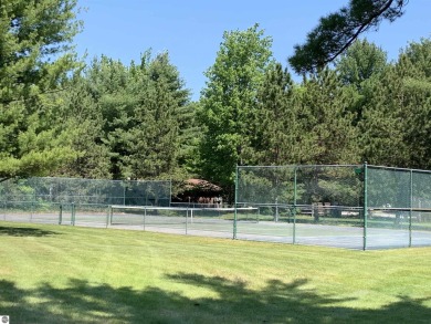 Embark on your Northern Michigan adventure with this spacious on Shanty Creek Golf Course in Michigan - for sale on GolfHomes.com, golf home, golf lot