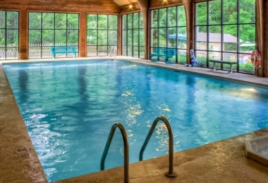 This generously sized 5.85 acre estate property includes two on Sapphire National Golf Club in North Carolina - for sale on GolfHomes.com, golf home, golf lot