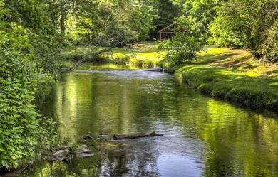 This generously sized 5.85 acre estate property includes two on Sapphire National Golf Club in North Carolina - for sale on GolfHomes.com, golf home, golf lot