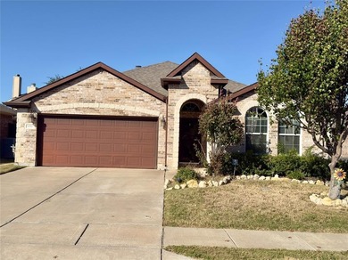 This very beautiful and well maintained 4-bedroom, 2-bath home on Eagle Mountain Country Club  in Texas - for sale on GolfHomes.com, golf home, golf lot