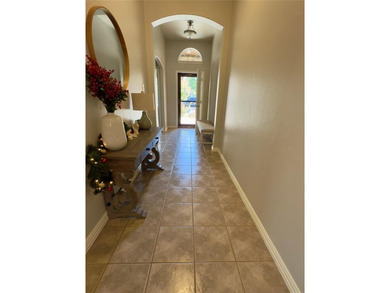 This very beautiful and well maintained 4-bedroom, 2-bath home on Eagle Mountain Country Club  in Texas - for sale on GolfHomes.com, golf home, golf lot