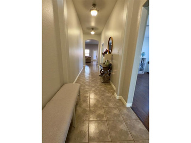 This very beautiful and well maintained 4-bedroom, 2-bath home on Eagle Mountain Country Club  in Texas - for sale on GolfHomes.com, golf home, golf lot