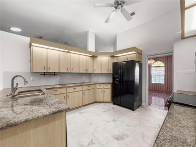 Resort-style living in the sought-after 55+ community of Oak Run on Royal Oaks Golf Club in Florida - for sale on GolfHomes.com, golf home, golf lot