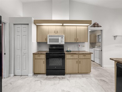 Resort-style living in the sought-after 55+ community of Oak Run on Royal Oaks Golf Club in Florida - for sale on GolfHomes.com, golf home, golf lot