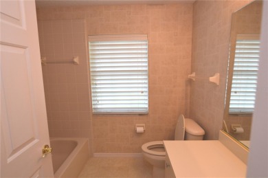 Savannah Square Serenity. Step into this charming 2 bed, 2 bath on The Grand Club - Pine Lakes Course in Florida - for sale on GolfHomes.com, golf home, golf lot