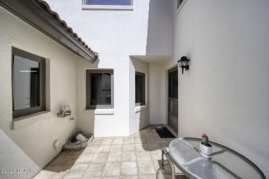 Imagine waking up every day in a beachside townhouse that feels on Oceans Golf Club in Florida - for sale on GolfHomes.com, golf home, golf lot