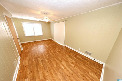 Welcome home! Located within walking distance of the Anniston on Anniston Municipal Golf Course in Alabama - for sale on GolfHomes.com, golf home, golf lot