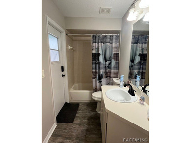 Beautiful modern Citrus Springs 3 bedrooms 2 bathrooms pool home on Citrus Springs Country Club in Florida - for sale on GolfHomes.com, golf home, golf lot