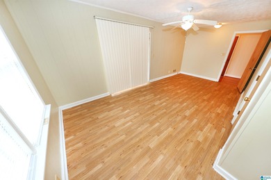 Welcome home! Located within walking distance of the Anniston on Anniston Municipal Golf Course in Alabama - for sale on GolfHomes.com, golf home, golf lot