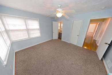 Welcome home! Located within walking distance of the Anniston on Anniston Municipal Golf Course in Alabama - for sale on GolfHomes.com, golf home, golf lot