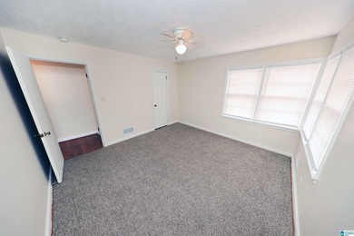 Welcome home! Located within walking distance of the Anniston on Anniston Municipal Golf Course in Alabama - for sale on GolfHomes.com, golf home, golf lot