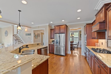 Welcome to effortless living and expansive golf course views at on Members Club At St. James Plantation in North Carolina - for sale on GolfHomes.com, golf home, golf lot