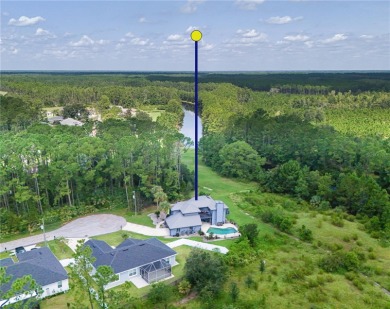 A rare find in Palm Coast, this 4-bedroom, 3-bath, 2,764 sq ft on Grand Club Matanzas in Florida - for sale on GolfHomes.com, golf home, golf lot