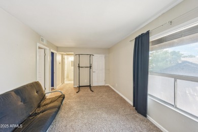 Spacious 3-bedroom, 2-bath townhouse with a loft in the on Bellaire Golf Club in Arizona - for sale on GolfHomes.com, golf home, golf lot