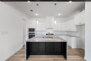 MLS# 20812362 - Built by Altura Homes - Jun 2025 completion! ~ on Heath Golf and Yacht Club in Texas - for sale on GolfHomes.com, golf home, golf lot