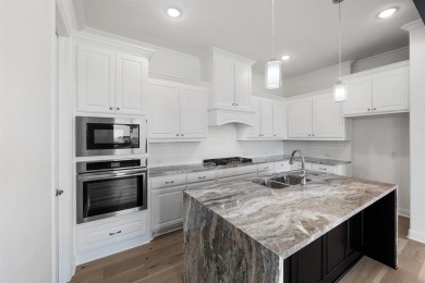 MLS# 20812362 - Built by Altura Homes - Jun 2025 completion! ~ on Heath Golf and Yacht Club in Texas - for sale on GolfHomes.com, golf home, golf lot