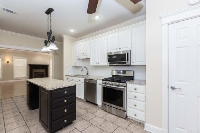 This spacious 2-story condo has an updated kitchen, primary on Centennial Valley Golf Course in Arkansas - for sale on GolfHomes.com, golf home, golf lot