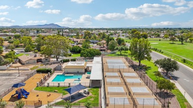 Spacious 3-bedroom, 2-bath townhouse with a loft in the on Bellaire Golf Club in Arizona - for sale on GolfHomes.com, golf home, golf lot