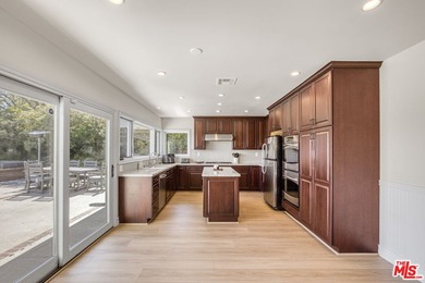 Golf Course & City Views! Perched in a prime Tarzana hillside on Braemar Country Club in California - for sale on GolfHomes.com, golf home, golf lot