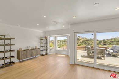 Golf Course & City Views! Perched in a prime Tarzana hillside on Braemar Country Club in California - for sale on GolfHomes.com, golf home, golf lot