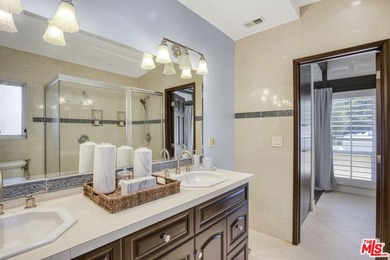 Golf Course & City Views! Perched in a prime Tarzana hillside on Braemar Country Club in California - for sale on GolfHomes.com, golf home, golf lot