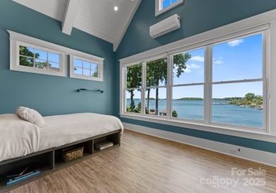 An exquisite lakefront property offering the perfect blend of on The Peninsula Club in North Carolina - for sale on GolfHomes.com, golf home, golf lot