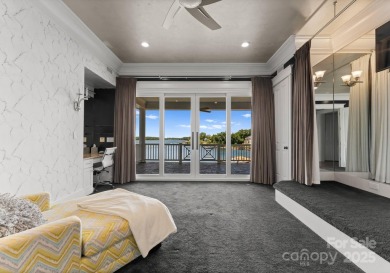 An exquisite lakefront property offering the perfect blend of on The Peninsula Club in North Carolina - for sale on GolfHomes.com, golf home, golf lot