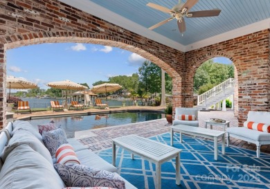 An exquisite lakefront property offering the perfect blend of on The Peninsula Club in North Carolina - for sale on GolfHomes.com, golf home, golf lot
