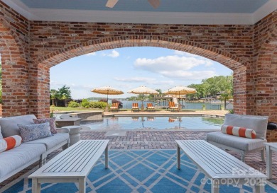 An exquisite lakefront property offering the perfect blend of on The Peninsula Club in North Carolina - for sale on GolfHomes.com, golf home, golf lot