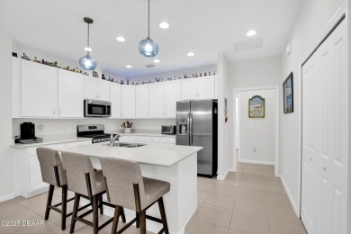 Find your living on island time dream in  this beautiful, open on LPGA International Golf Course in Florida - for sale on GolfHomes.com, golf home, golf lot