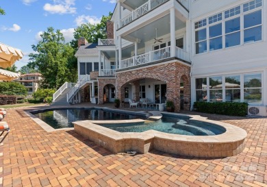 An exquisite lakefront property offering the perfect blend of on The Peninsula Club in North Carolina - for sale on GolfHomes.com, golf home, golf lot