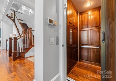 An exquisite lakefront property offering the perfect blend of on The Peninsula Club in North Carolina - for sale on GolfHomes.com, golf home, golf lot