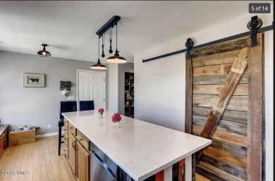 This home has it all: 5 bedrooms and 3.5 baths, or use the lower on Gypsum Creek Golf Course in Colorado - for sale on GolfHomes.com, golf home, golf lot